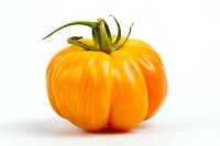 Fresh ripe yellow heirloom tomato isolated on white background. Perfect for food packaging, cooking blogs, and healthy eating promotional materials.