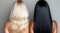 Contrasting blonde and black long straight hair on two women shown from behind, demonstrating professional hair coloring and styling results for beauty salon promotion.
