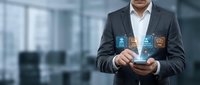 Professional businessman using smartphone with digital interface icons in modern office environment for business technology applications.