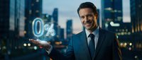 Businessman in dark suit holding glowing zero percent symbol against illuminated city skyline at night, representing interest rates, financial offers, or promotional deals.