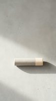 Minimalist wooden USB flash drive on concrete surface with natural lighting and shadow for modern technology branding and digital storage concepts.