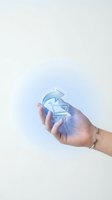 Hand holding glowing blue holographic arrow and envelope icons with light effects, representing digital communication, email forwarding, and data transfer technology concepts.