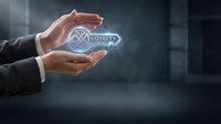 Businessman holding glowing loyalty program icon with circular badge symbol, representing customer retention, rewards, and business growth strategy.