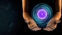 Hands holding glowing energy sphere with purple core and blue rings, mystical power concept for spiritual healing and meditation practices.