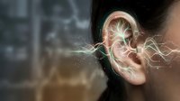 Digital hearing aid technology with glowing neural pathways showing sound processing and auditory enhancement for modern healthcare solutions.