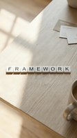 Wooden letter blocks spelling FRAMEWORK on desk with business cards and coffee cup in warm natural lighting for corporate strategy concepts.