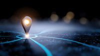 Glowing location pin marker on digital network map with blue light trails and dark background, representing global positioning and navigation technology.