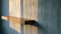 Minimalist wooden shelf mounted on concrete wall with dramatic natural lighting creating geometric shadows and warm sunbeams for modern interior design.