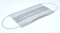 Disposable surgical face mask with elastic ear loops and pleated filter layers, isolated on white background for medical, healthcare, and safety design applications.