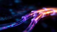 Glowing fiber optic cables with purple and orange light trails against dark background showcase high-speed data transfer and digital connectivity technology.
