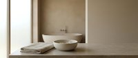 Minimalist bathroom shelf with ceramic bowl, folded towel, and neutral beige tones, suitable for spa, wellness, and home decor design projects.