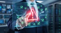 Cybersecurity professional analyzing digital threat detection system with warning alert and security checklist in modern data center environment.