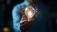Male professional in blue shirt holding glowing light bulb with connected network nodes, representing innovation, technology, and creative ideas for business solutions.