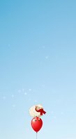 Cute sheep character with red bow sitting on red heart balloon against clear blue sky with bokeh lights, suitable for greeting cards and children's illustrations.