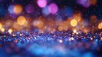 Magical glowing bokeh lights on dark blue background with sparkles and blurred circles creating dreamy atmosphere for festive designs and holiday backgrounds.