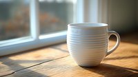 White ceramic coffee mug with horizontal ribbed texture on wooden table near window, morning sunlight casting long shadow, minimalist composition for lifestyle blogs.
