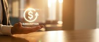 Businessman holding glowing subscription icon with dollar sign and circular arrow, representing recurring payment and membership service concept.