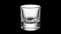 Empty shot glass isolated on transparent background, ready for beverage, bar, and hospitality design projects, t-shirt graphics, and print-on-demand products.