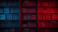 Library bookshelf with books in gradient blue to red lighting creating dramatic atmosphere for education and knowledge concepts.