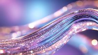 Shimmering wave of pink and blue glitter particles flowing in smooth curved lines against blurred bokeh background, creating magical ethereal effect.