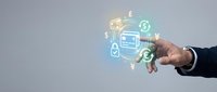 Male hand in business suit holding smartphone with glowing financial icons including wallet, dollar sign, and currency symbols floating above screen for digital banking and mobile payment concepts.
