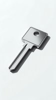 Metallic key with square head and circular hole isolated on white background, casting sharp shadow. Suitable for security, access, and lock-related designs.