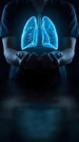 Glowing blue lungs floating above cupped hands of person in dark shirt. Medical healthcare concept for respiratory system protection and pulmonology education.