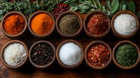 Aromatic spices and herbs in wooden bowls arranged in rows on dark wooden surface with fresh herbs and cranberries, culinary seasoning collection.