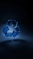 Glossy blue glass recycling symbol floating on dark background, casting soft shadow, representing sustainability and eco-friendly concepts.