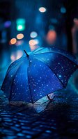 Blue umbrella with starry pattern reflecting city lights in rain puddles against dark night background with bokeh lights creates magical atmosphere.