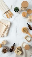Eco-friendly zero waste beauty and skincare products with wooden utensils, natural ingredients, and reusable storage containers arranged on marble background for sustainable lifestyle.