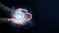 Hand holding glowing digital sphere with blue light energy, representing technology, innovation, and future digital transformation concepts for business and science applications.