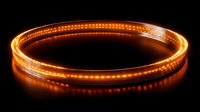 Glowing orange LED light ring creates dramatic circular light trail effect against dark background, illuminated neon circle for modern technology designs.