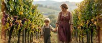 Caucasian mother and young son walk hand in hand through lush vineyard rows at harvest time, warm golden light, rolling hills background.