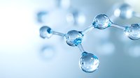 Molecular structure with transparent water droplets forming chemical bonds against soft blue background, science concept for chemistry and biology research.