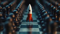 Toy rocket on chess board surrounded by black pawns, symbolizing business breakthrough and strategic leadership in competitive market space.