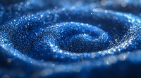 Swirling blue glitter particles forming spiral pattern on dark background with bokeh light effects and magical sparkle dust texture. Cosmic abstract design.