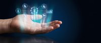 Hand holding holographic digital security icons with lock symbols and data analytics floating above palm on dark blue background for cybersecurity concepts.