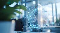 Glowing digital sphere with connected dots and lines floating in modern office space, blurred background with plants creates futuristic atmosphere.