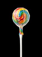 Rainbow swirl lollipop candy isolated on transparent background, ready for t-shirt design, stickers, clipart, print on demand, and sublimation projects.