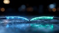 Glowing fiber optic cables with blue and green light reflecting on wet surface at night, creating futuristic technology mood for connectivity concepts.