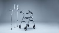 Medical mobility aids including walker with wheels and adjustable crutches on clean white background for healthcare and rehabilitation support.