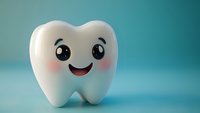 Cute cartoon tooth character with happy smiling face and rosy cheeks on turquoise background. Dental care and oral hygiene concept for children's dentistry.