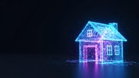 Digital wireframe house model with glowing neon lights on dark background. Futuristic smart home technology concept for real estate and property innovation.