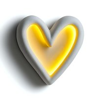 Glowing neon heart shape in white ceramic frame casting warm yellow light and soft shadow on white background, modern romantic design element.