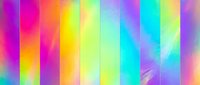 Vibrant rainbow gradient stripes with holographic iridescent effect creating colorful abstract background for modern digital design projects.