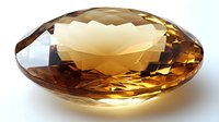 Oval cut golden citrine gemstone with brilliant facets and deep amber hues on white background, showcasing natural crystalline structure and transparency.