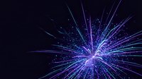 Abstract purple and blue light burst with radiating beams and particles on dark background for digital art, technology presentations and futuristic designs.