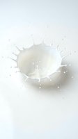 White milk splash creating crown shape with droplets on clean background for dairy and beverage advertising campaigns.