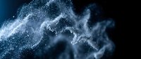 Flowing wave of white particles and dust dispersing against dark background, creating dynamic motion effect for technology and digital concepts.